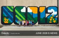 Huge outdoor colorful mural of the Castleton, ND zip code of 58012 with 10 children standing in front of it