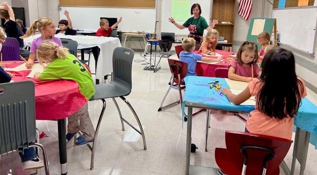Ellendale students doing art with teacher Jamie Eberle