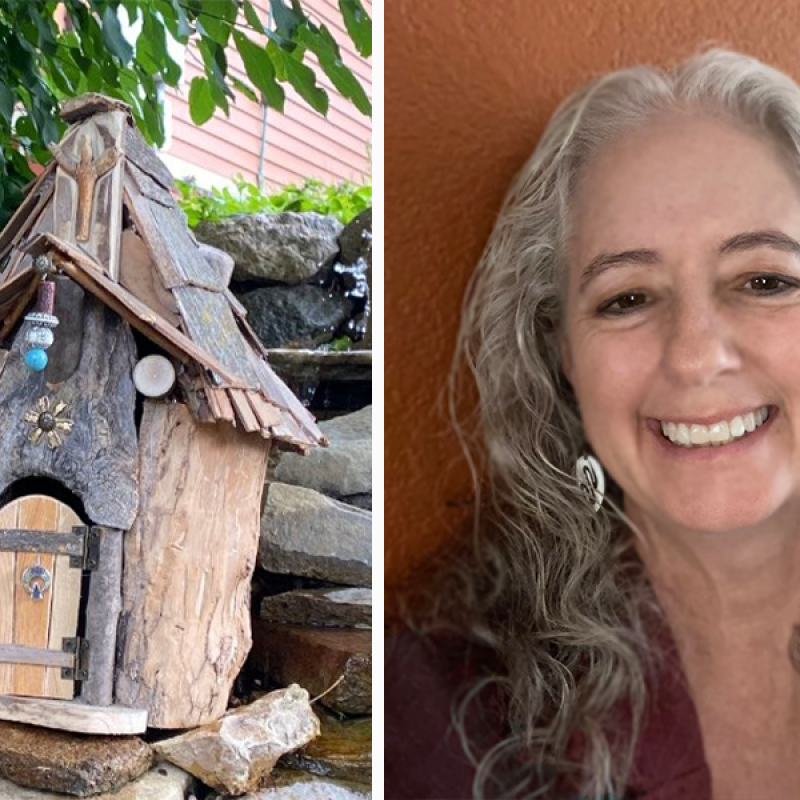 Sculpture of wooden fairy house on the left with head and shoulders image of artist and creator Kimberly Eslinger on the right, with long, curly grey hair and a big toothy smile