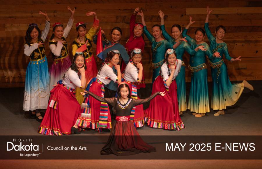 NDCA's May 2025 E-news Header showing a big group of female Chinese dancers in full regalia, posing on a stage