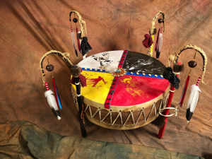 Native American drum with white, black, yellow and red colors to represent 4 seasons, 4 directions, and more symbolism in Native culture