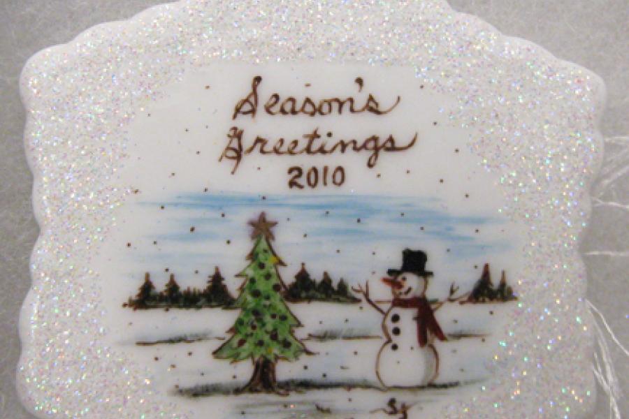 Season Greetings ornaments with tree and snowman