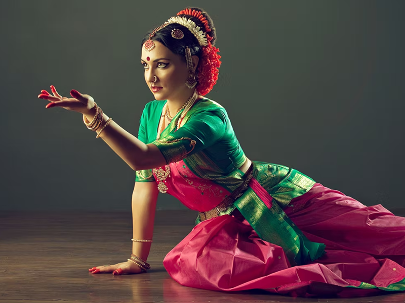 Female dancer from India, posing in full regalia
