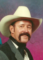 Bill Lowman wearing 2-tone jacket, cowboy hat, mustache on faded pink and purple background