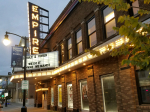 Empire Arts Center view from the street - red brick building with tall lighted sign