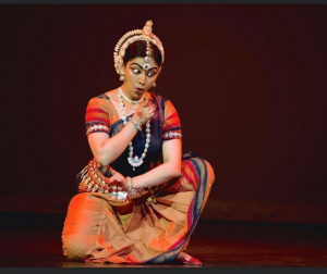 Aparupa Chatterjee performing a classic Indian dance while in full regalia