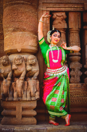 Aparupa Chatterjee performing a classic Indian dance while in full regalia