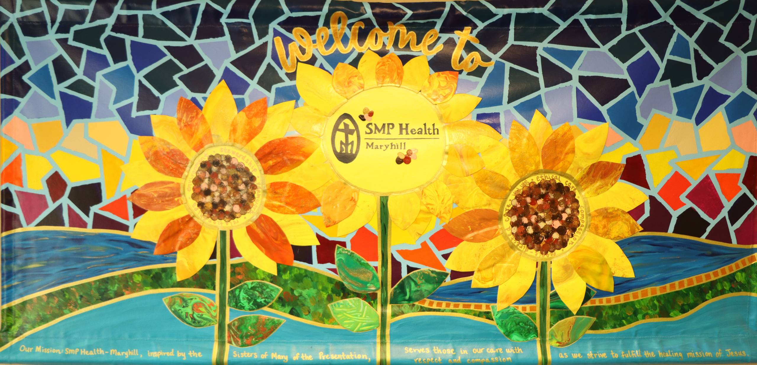 Local artist and teacher Shellee Sauer worked with residents in creating this welcoming painting hung inside the entrance to Maryhill Manor. Straws were used to blow paint across the surface of material that was then layered and assembled into this artwork.  This activity provided a fun, unique way of painting that made it easier for those with arm mobility issues to participate and fostered lung exercise