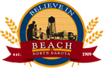 Circle logo with wheat in the background and a banner on the bottom with words Believe in Beach, North Dakota