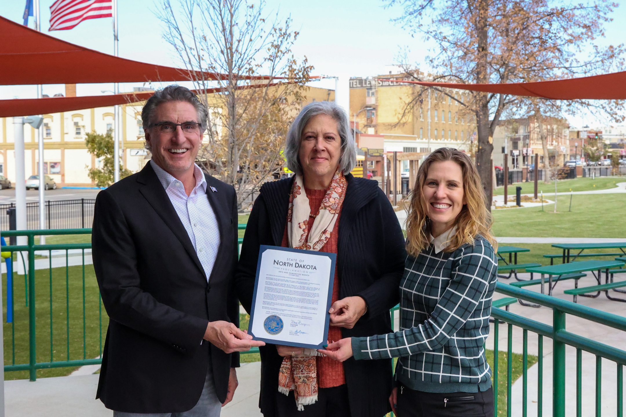 Governor Doug Burgum, ND Council on the Arts director Kim Konikow and Humanities director Brenna Gerhardt