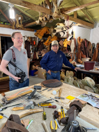 Troyd Geist and Dave Urlacher at Dave's Saddle-making studio in Belfield